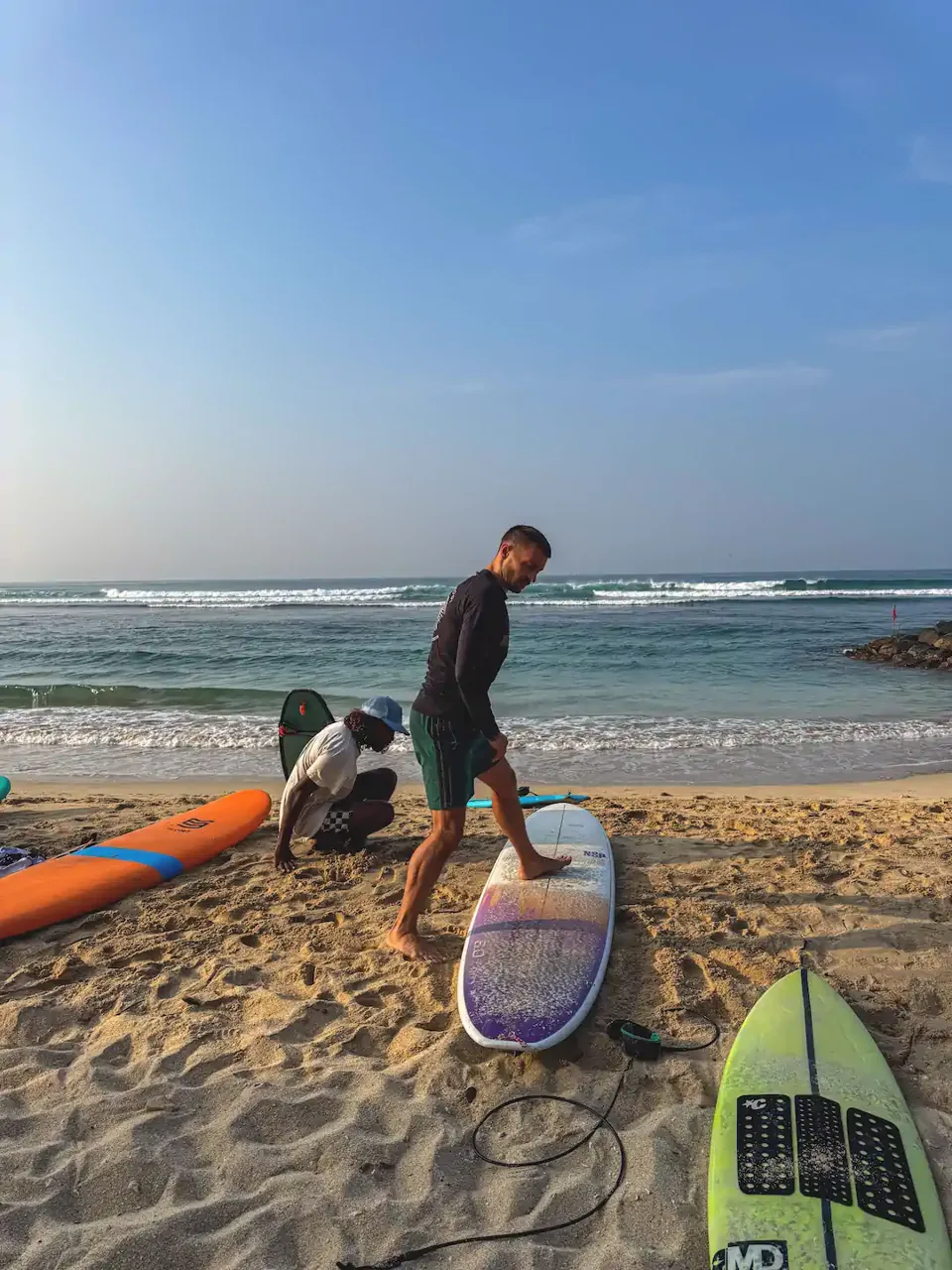Surfboards ready to rent beside Kabalana Beach